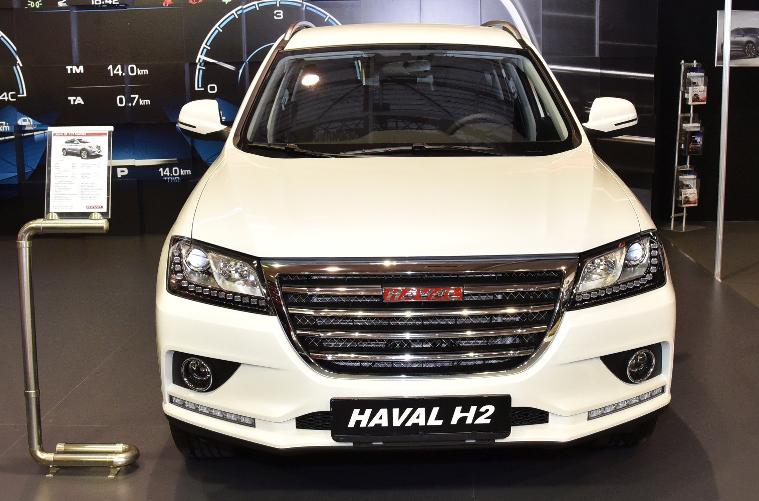 White SUV front with chrome grille and LED headlights