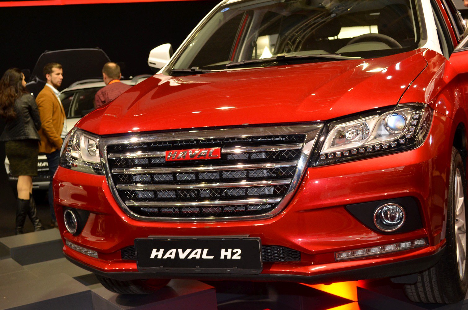 Close-up of SUV front grille and headlights
