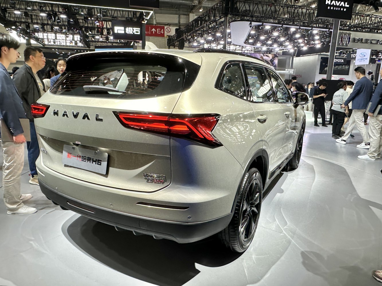 Rear and side view of SUV with red taillights and black alloy wheels