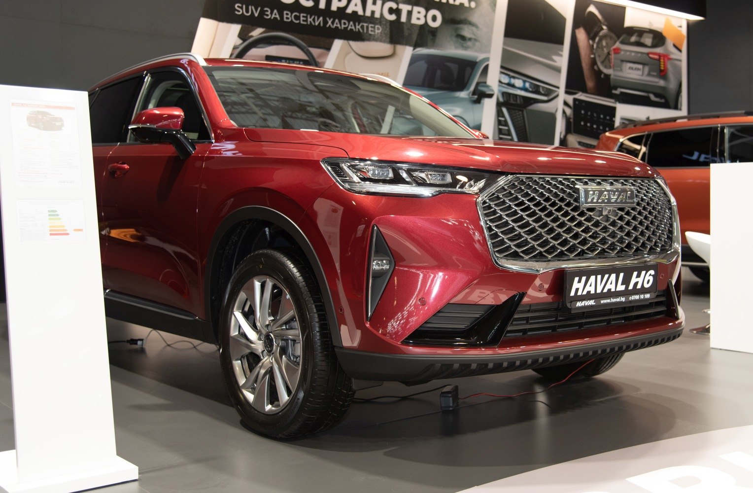 Bold front grille and sleek LED headlights on red SUV