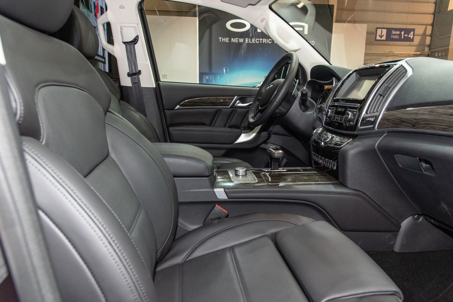 Leather seats, wood trim dashboard, center console, modern steering wheel