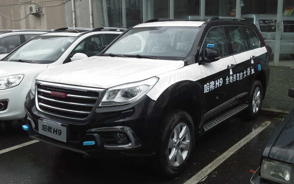 SUV front and side view with protective white covers