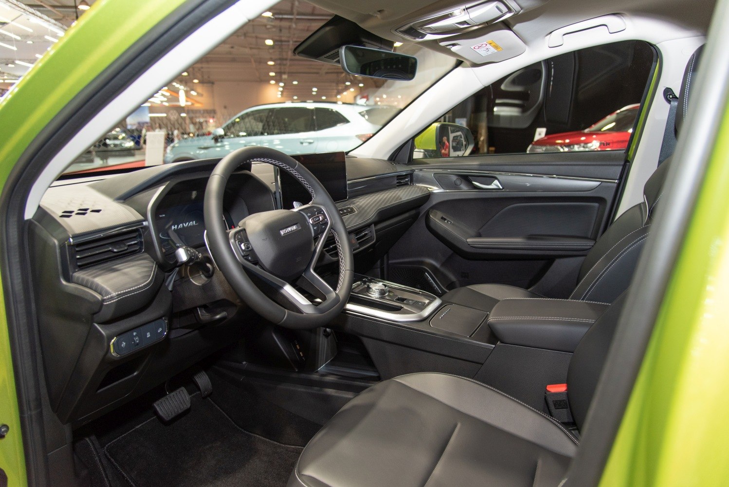 Modern car interior with digital dashboard and multifunction steering wheel
