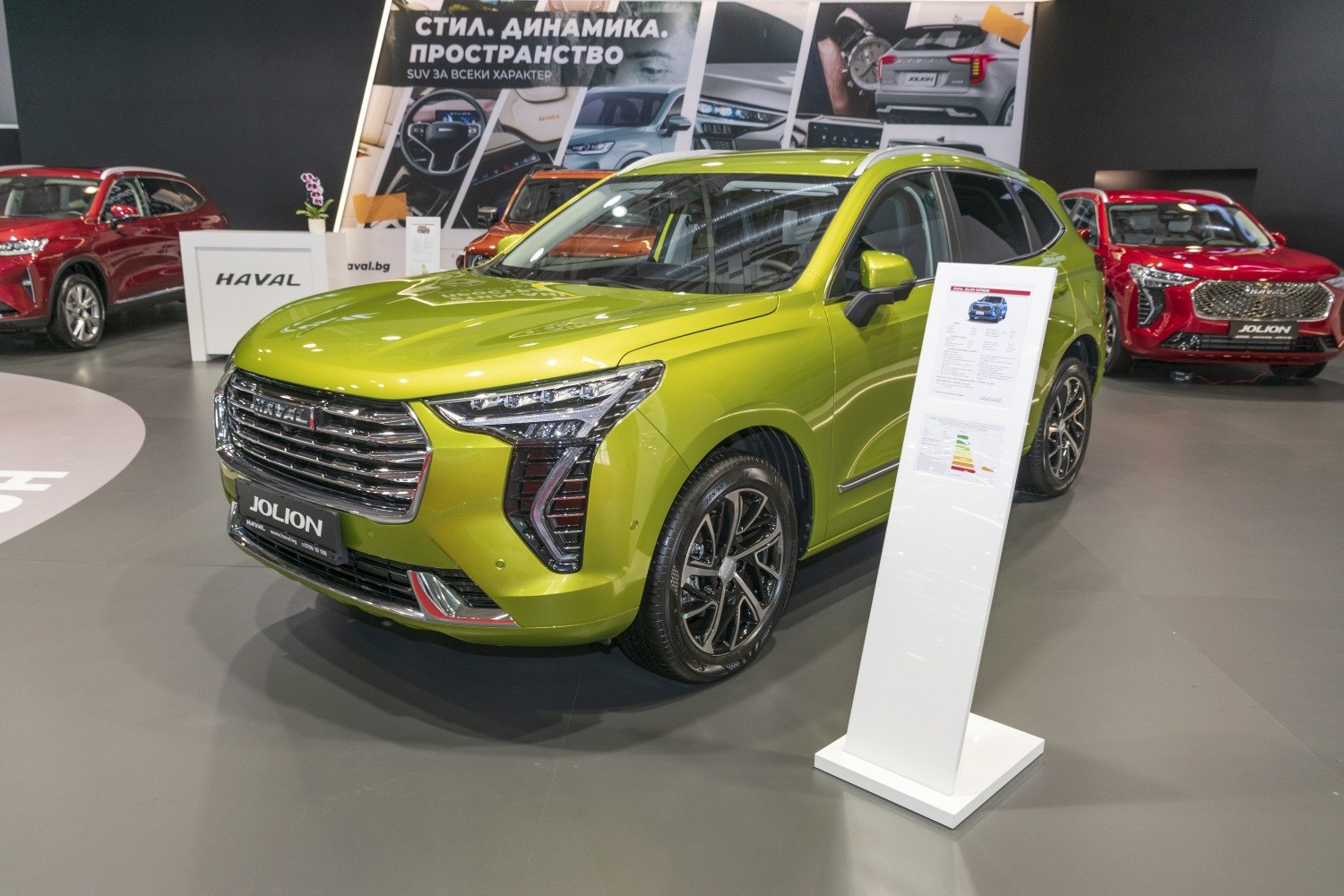 Lime green SUV with LED headlights and chrome grille