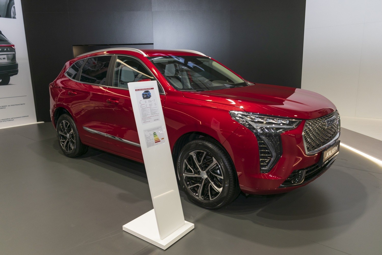 Red SUV with bold grille and modern LED headlights