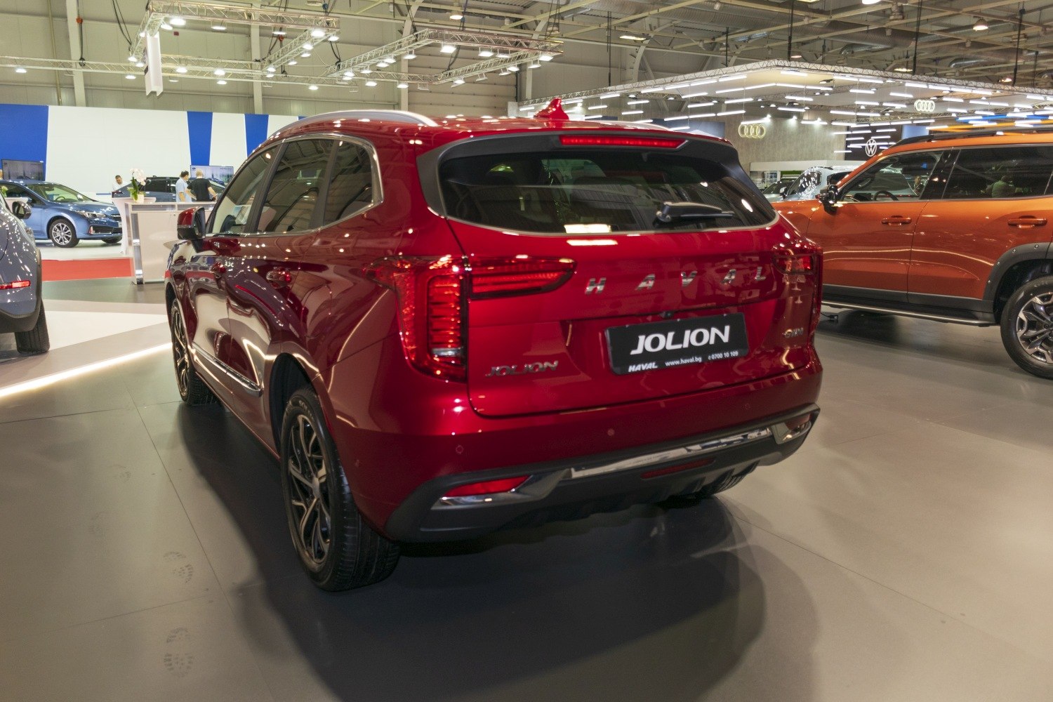 Rear view with taillights, rear window, and alloy wheels