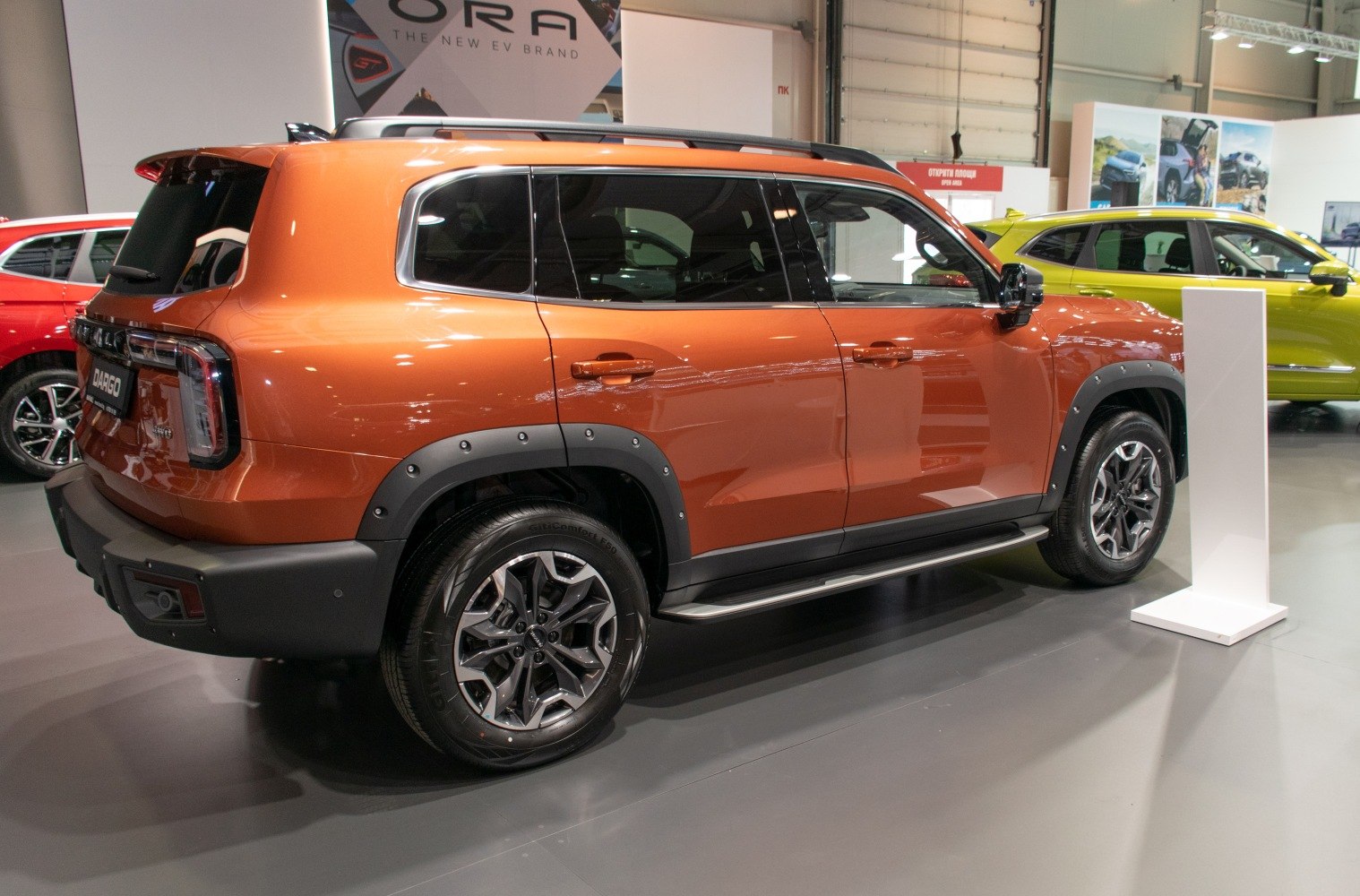 Side and rear view of SUV with rugged wheel arch flares and alloy wheels