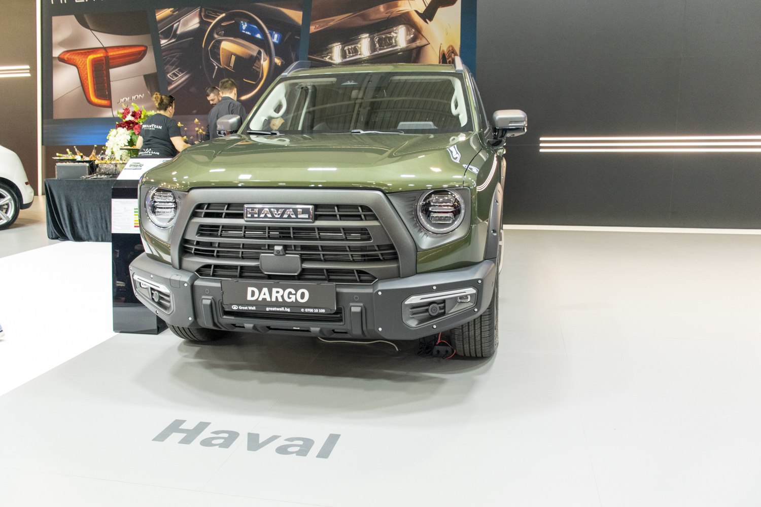 Rugged SUV front with round LED headlights and prominent grille
