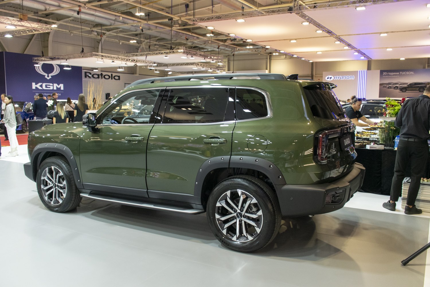 Side and rear view of SUV with rugged fender flares and alloy wheels
