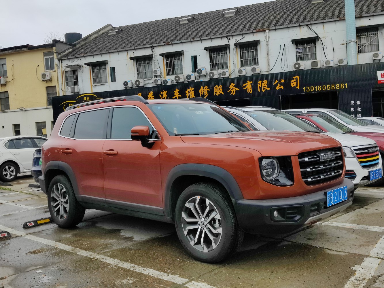 Rugged SUV with circular headlights and black front grille