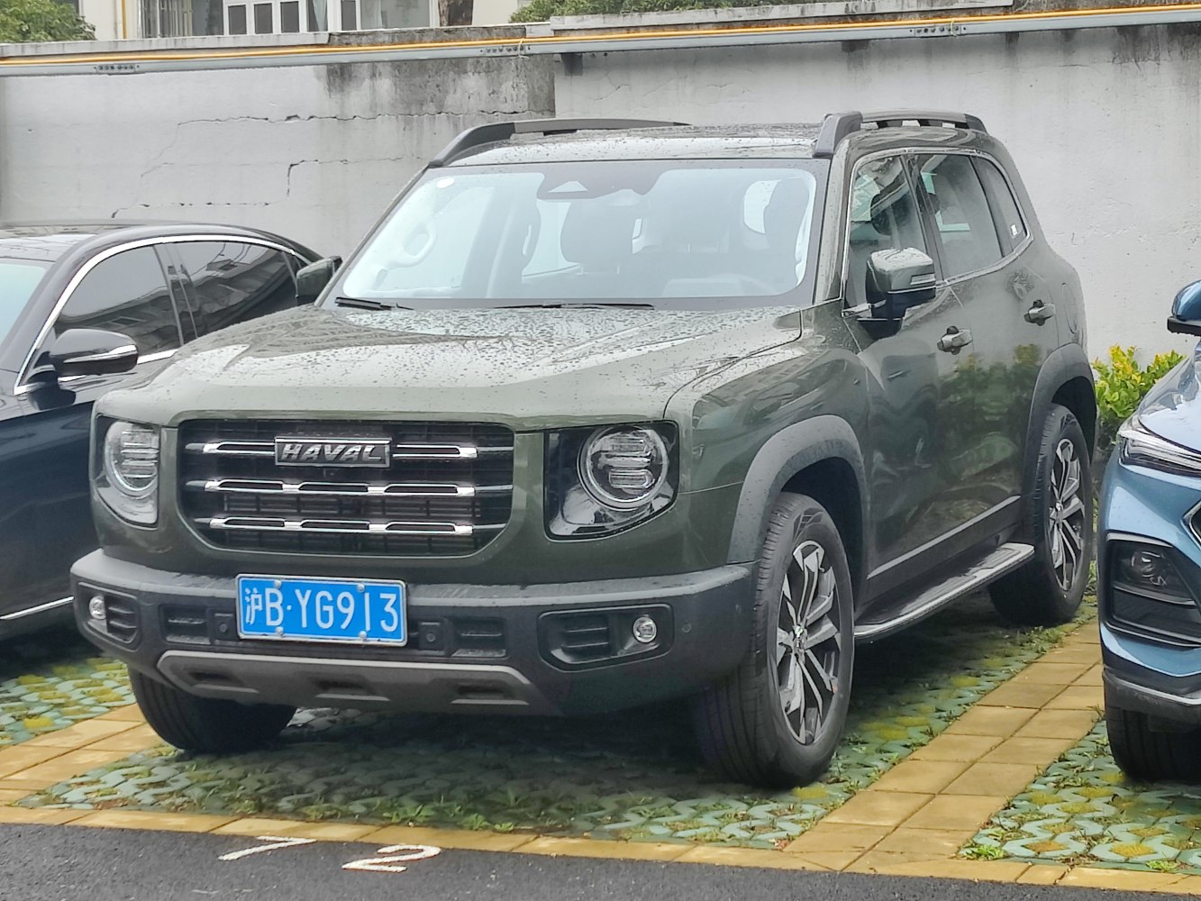 Front and side view of an SUV with bold grille and LED headlights