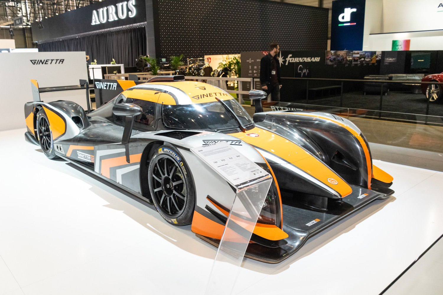 Aerodynamic racing prototype with carbon fiber body and racing wheels