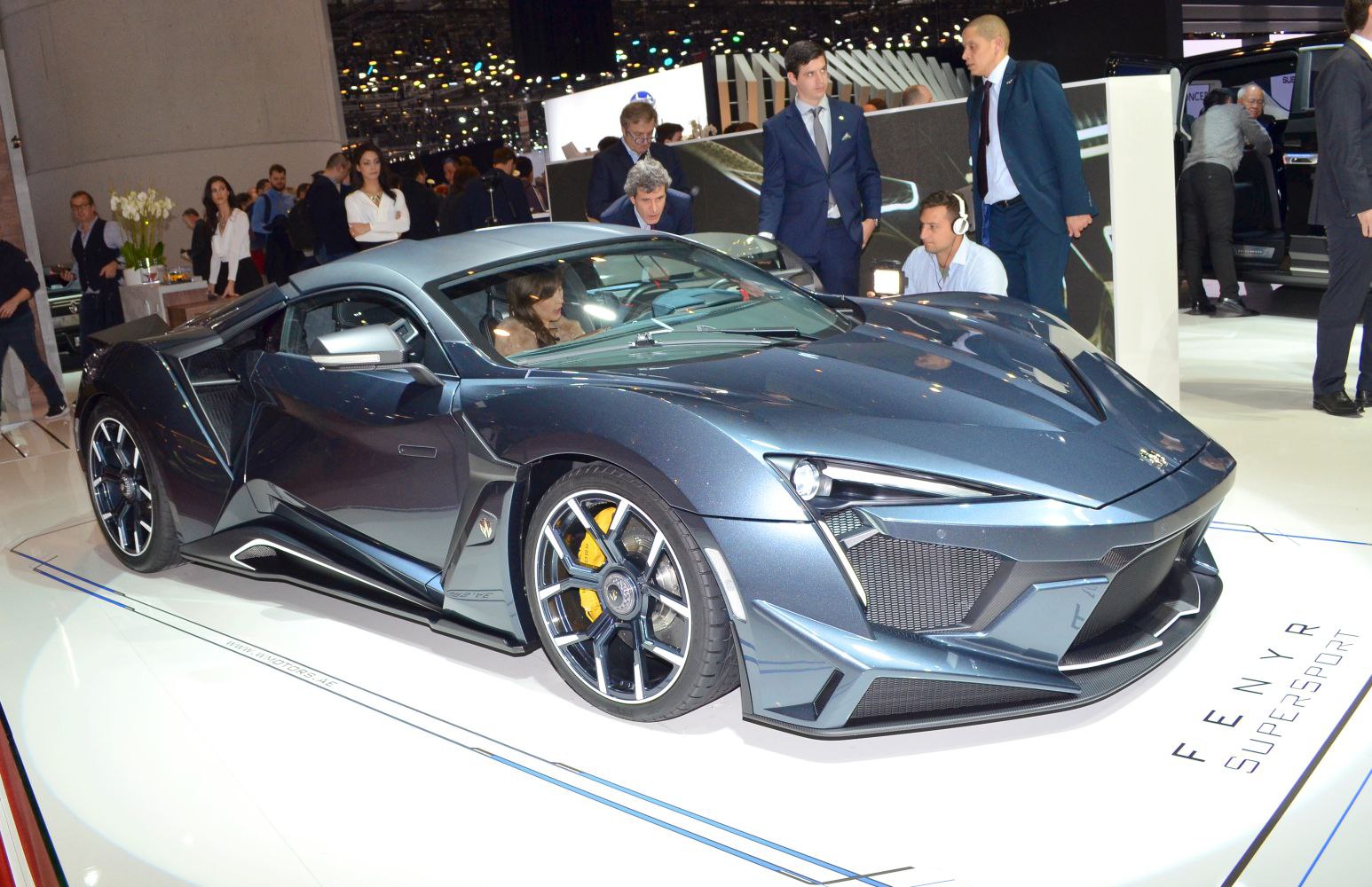 Aggressive aerodynamic front and distinctive alloy wheels on a sleek sports hypercar