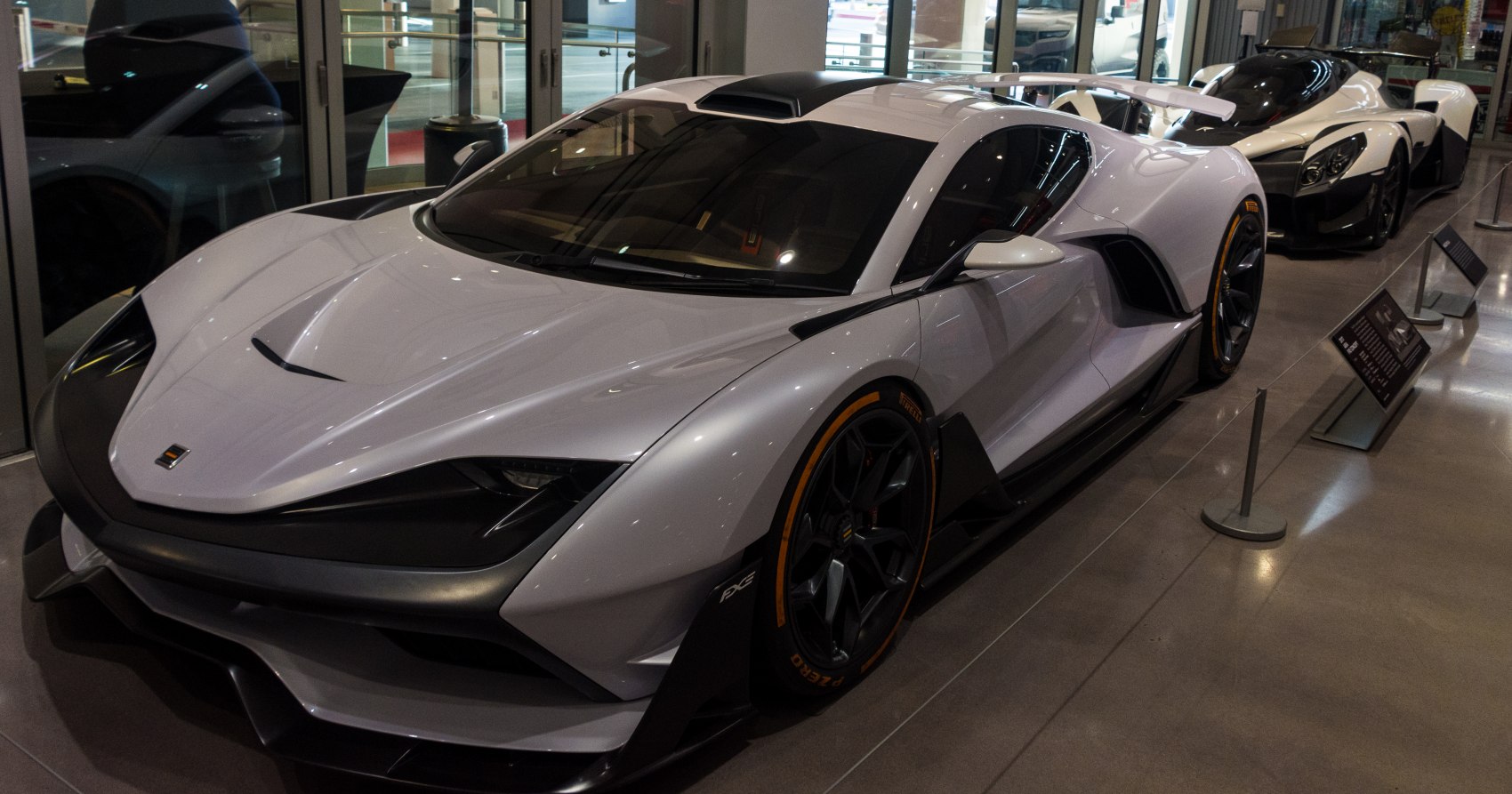 Aerodynamic front side view of a high-performance hybrid hypercar