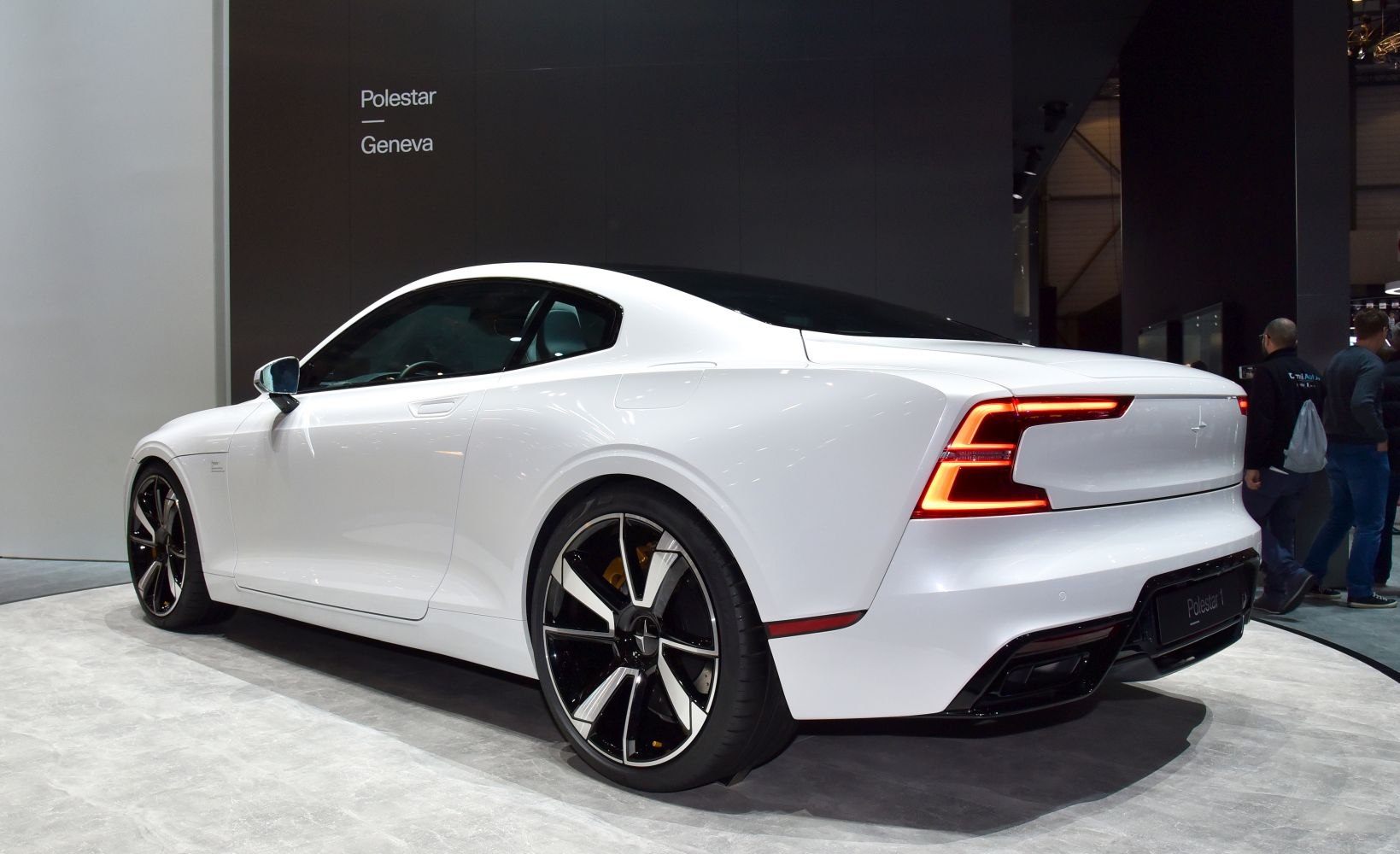 White coupe rear side view with LED taillights