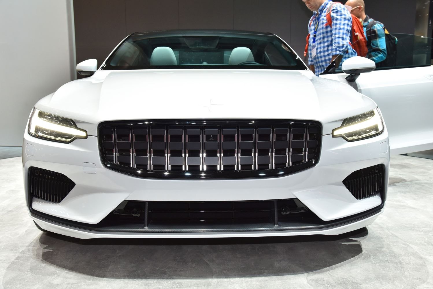 Front grille and LED headlights of a modern luxury vehicle.