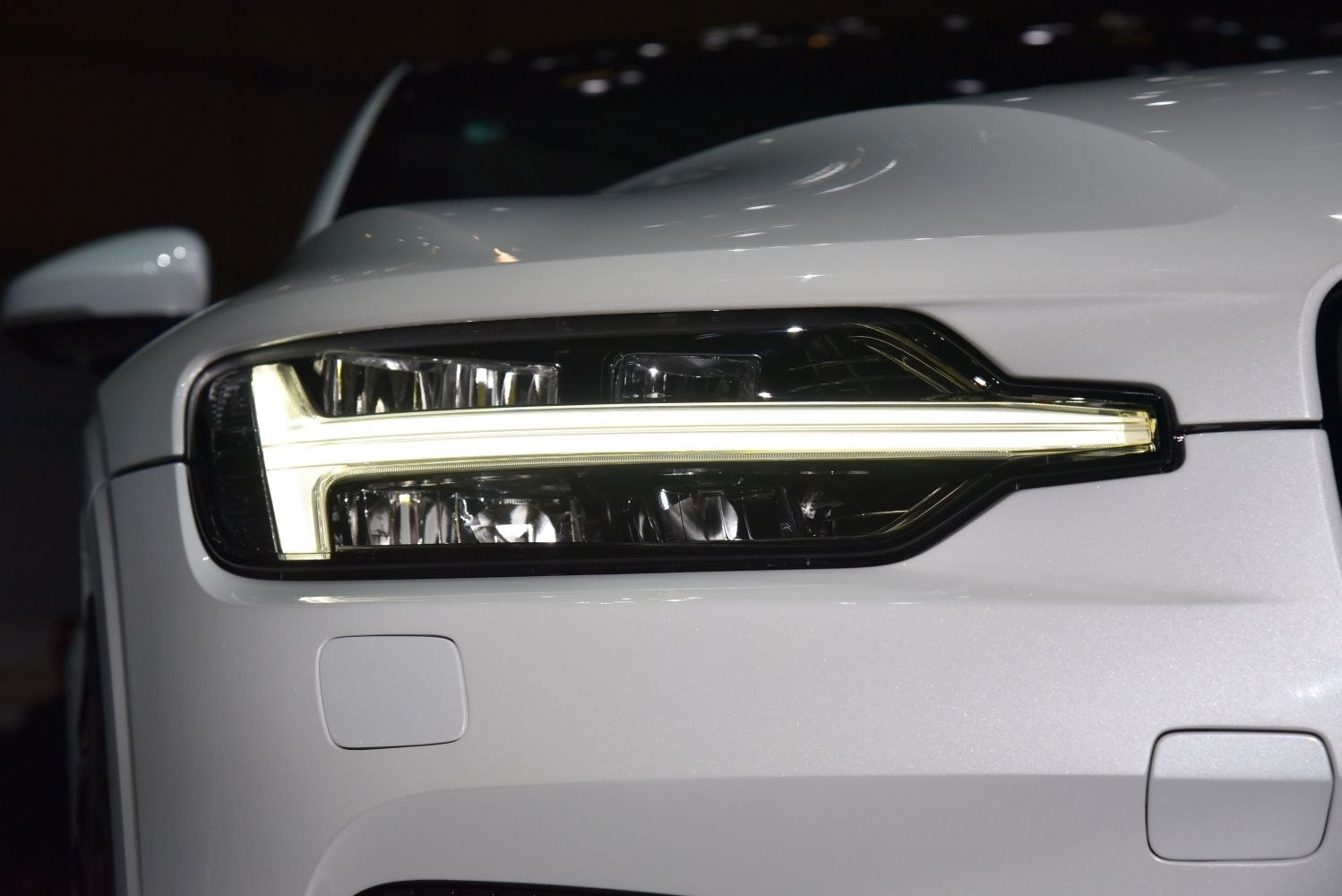 Close-up of modern LED headlight with a horizontal light bar