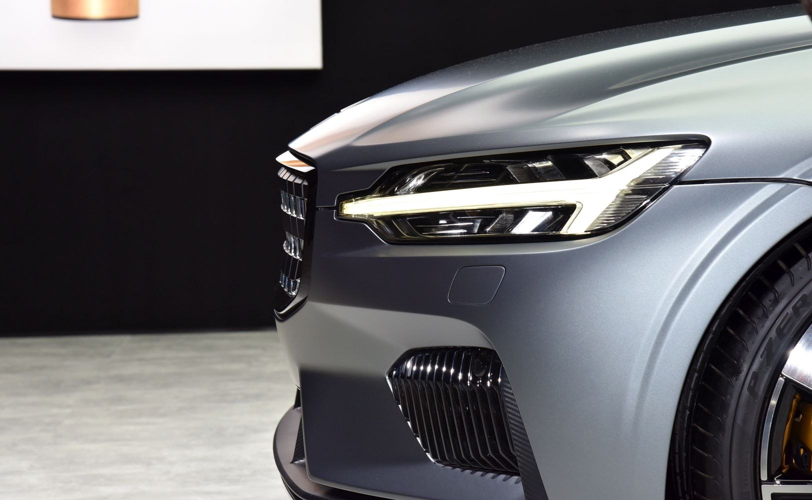 LED front headlight and aggressive front grille with tire detail