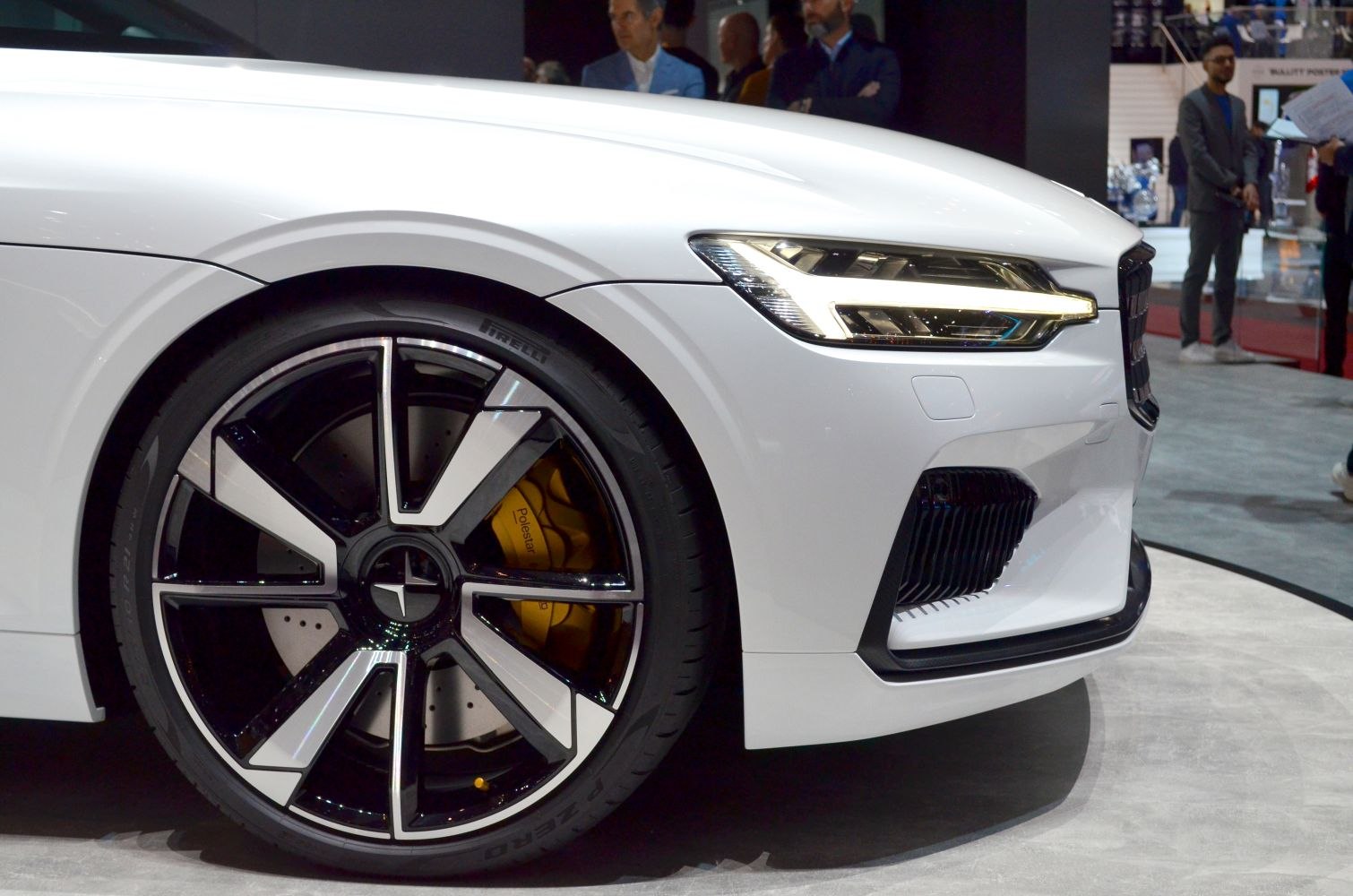 Front wheel with yellow brake caliper and LED headlight design