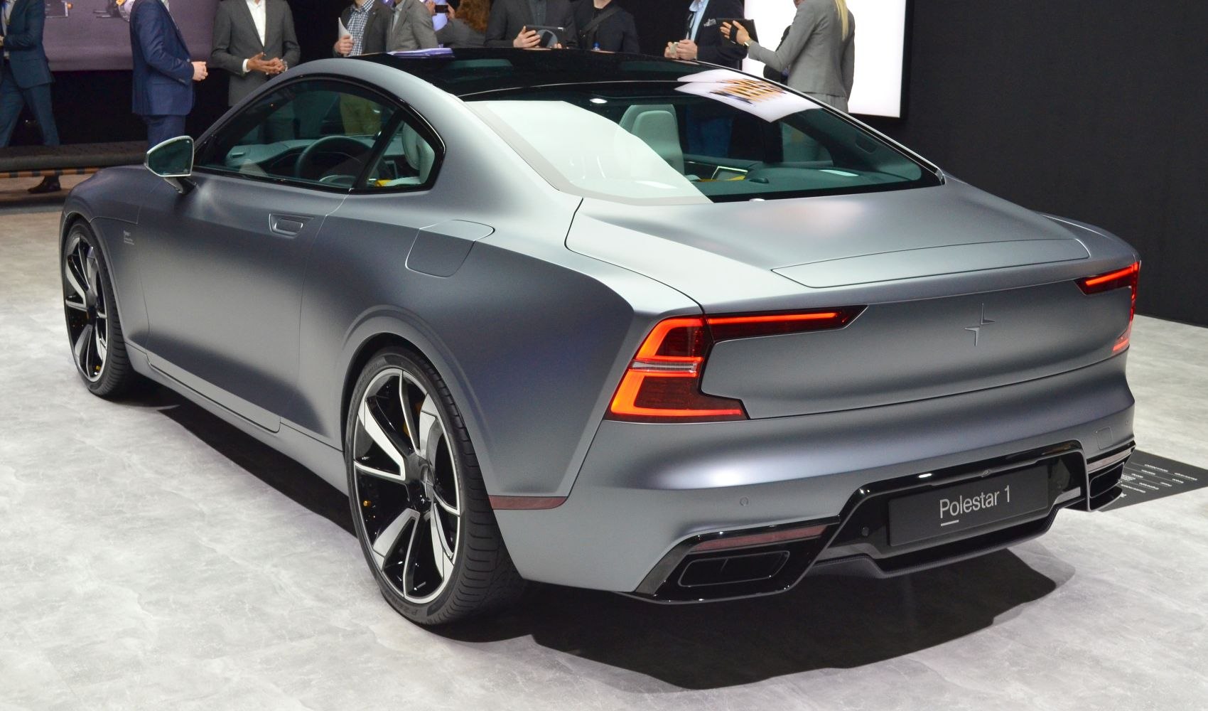Rear view of a coupe with sharp LED tail lights and matte finish