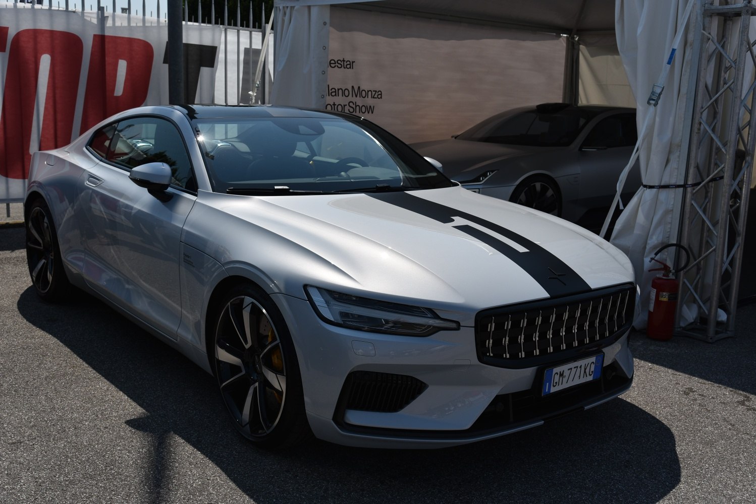 Front view with black racing stripe and alloy wheels