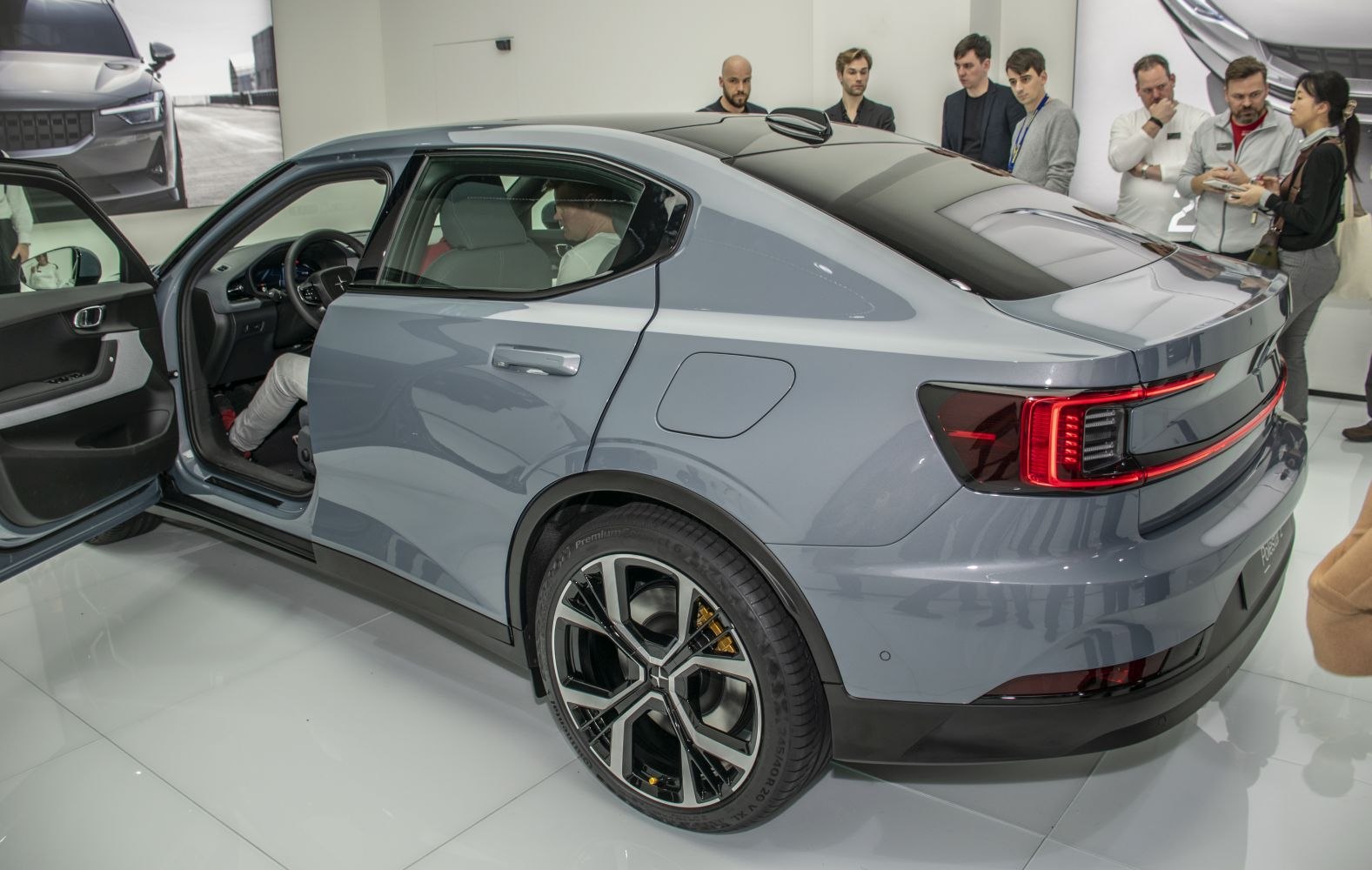 Rear side view with distinct tail light and sporty alloy wheel design
