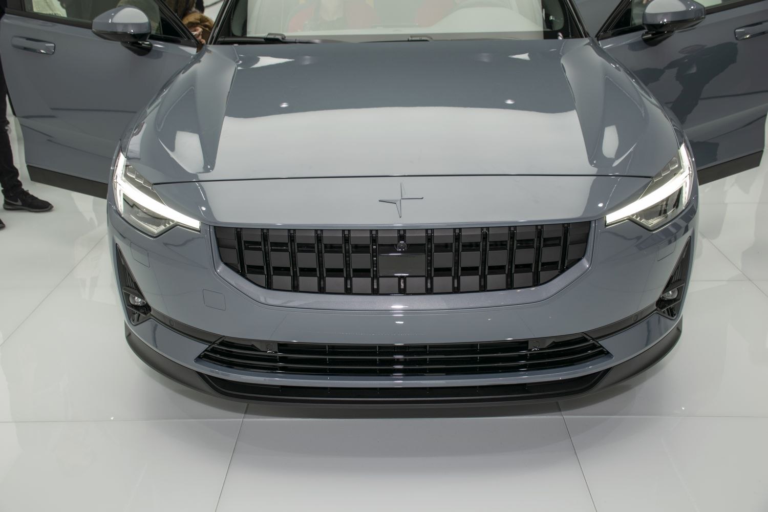 Front view with LED headlights and black grille