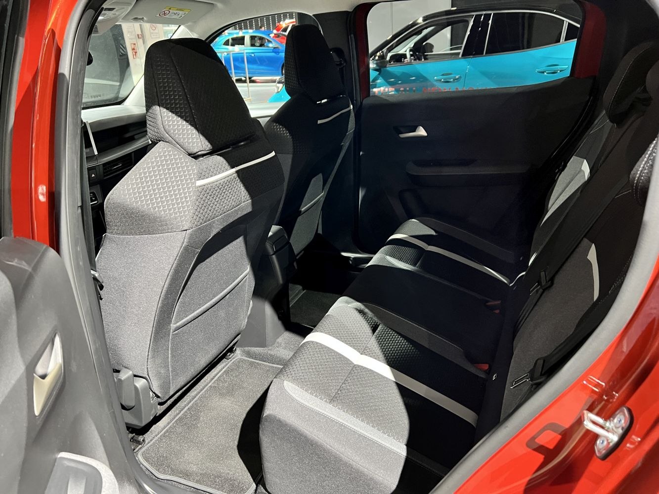 Rear seat interior with modern fabric upholstery and spacious legroom