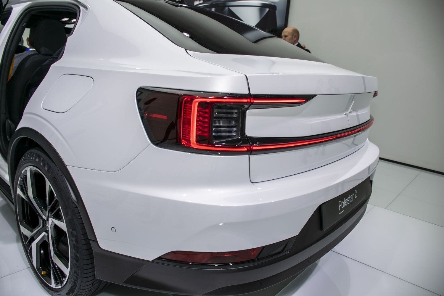 Rear LED tail light and alloy wheel design close-up.