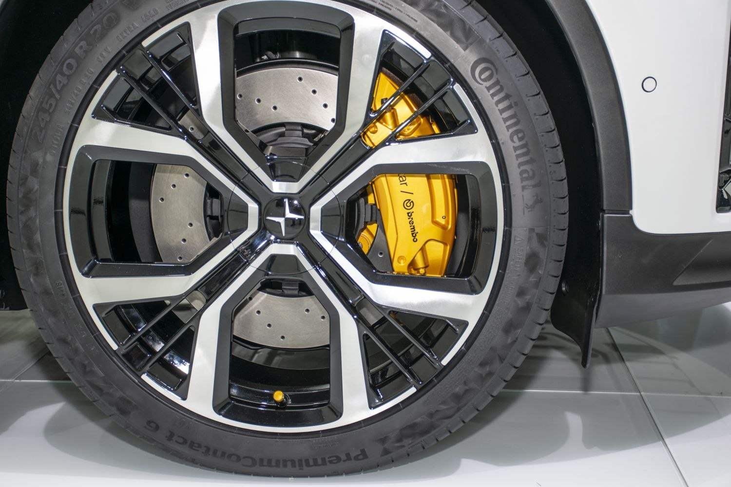 Alloy wheel with yellow Brembo brake caliper and Continental tire