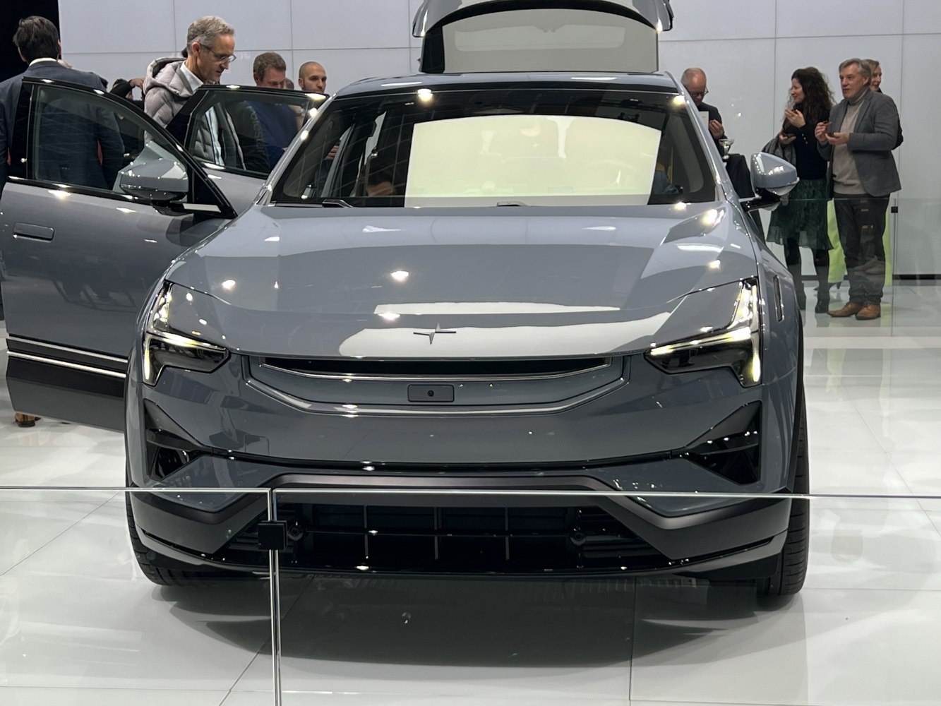Front view of electric SUV with LED headlights and modern grille