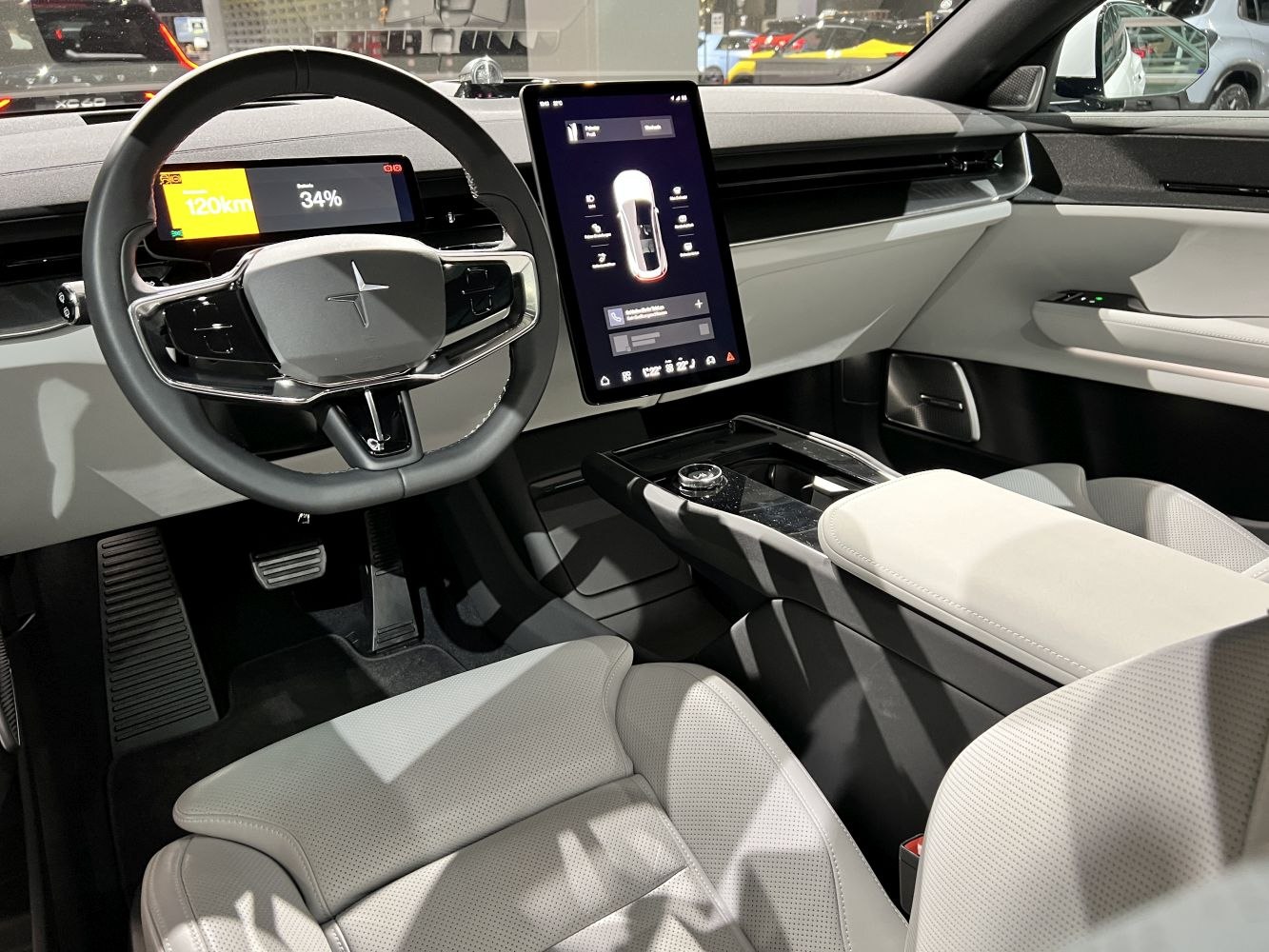 Digital instrument cluster and large vertical touchscreen in modern car interior
