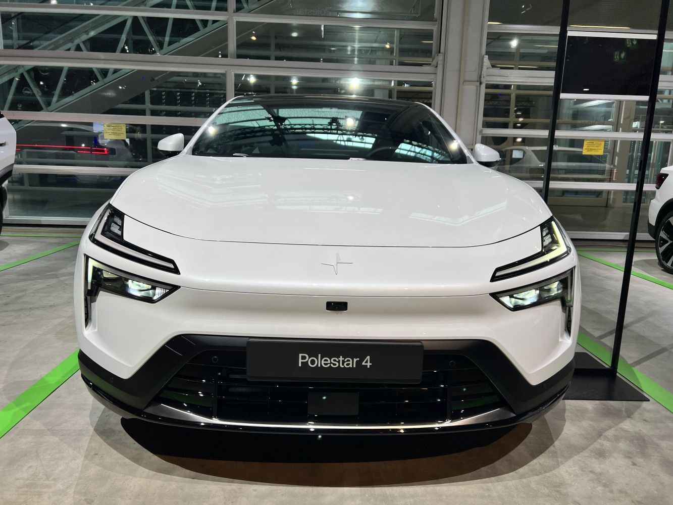 Front end with angular LED headlights and smooth aerodynamic design