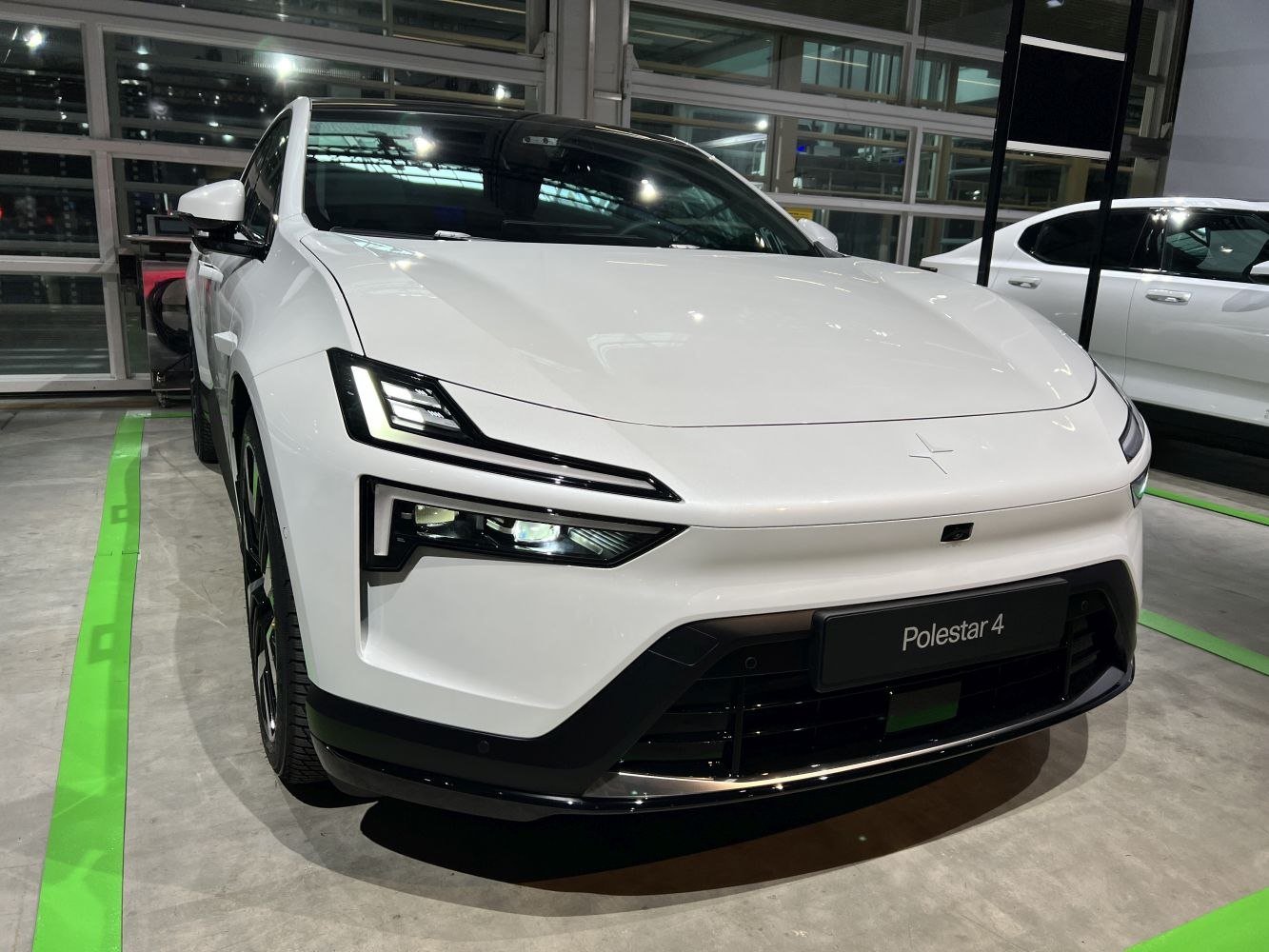 White electric vehicle front with distinctive LED headlights