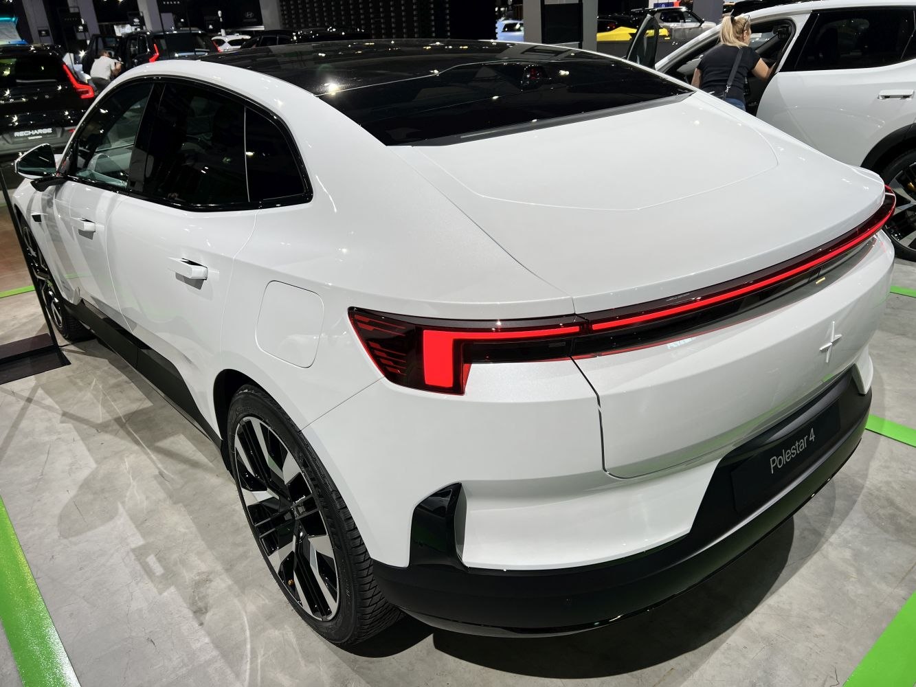 Rear and side view with connected LED tail light strip and black roof