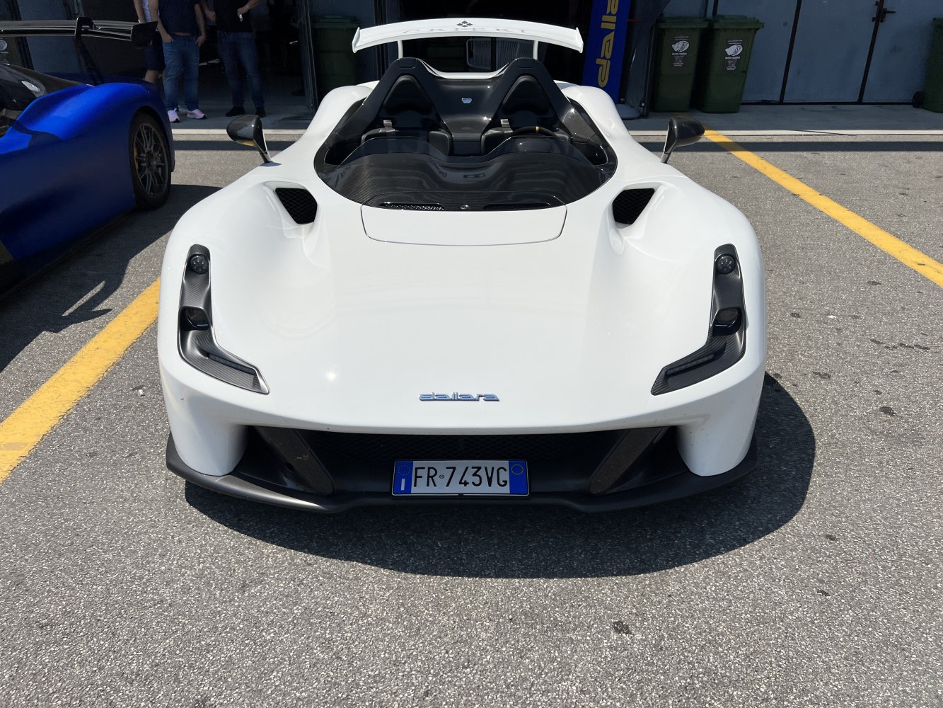 Aerodynamic front with open cockpit and carbon fiber accents