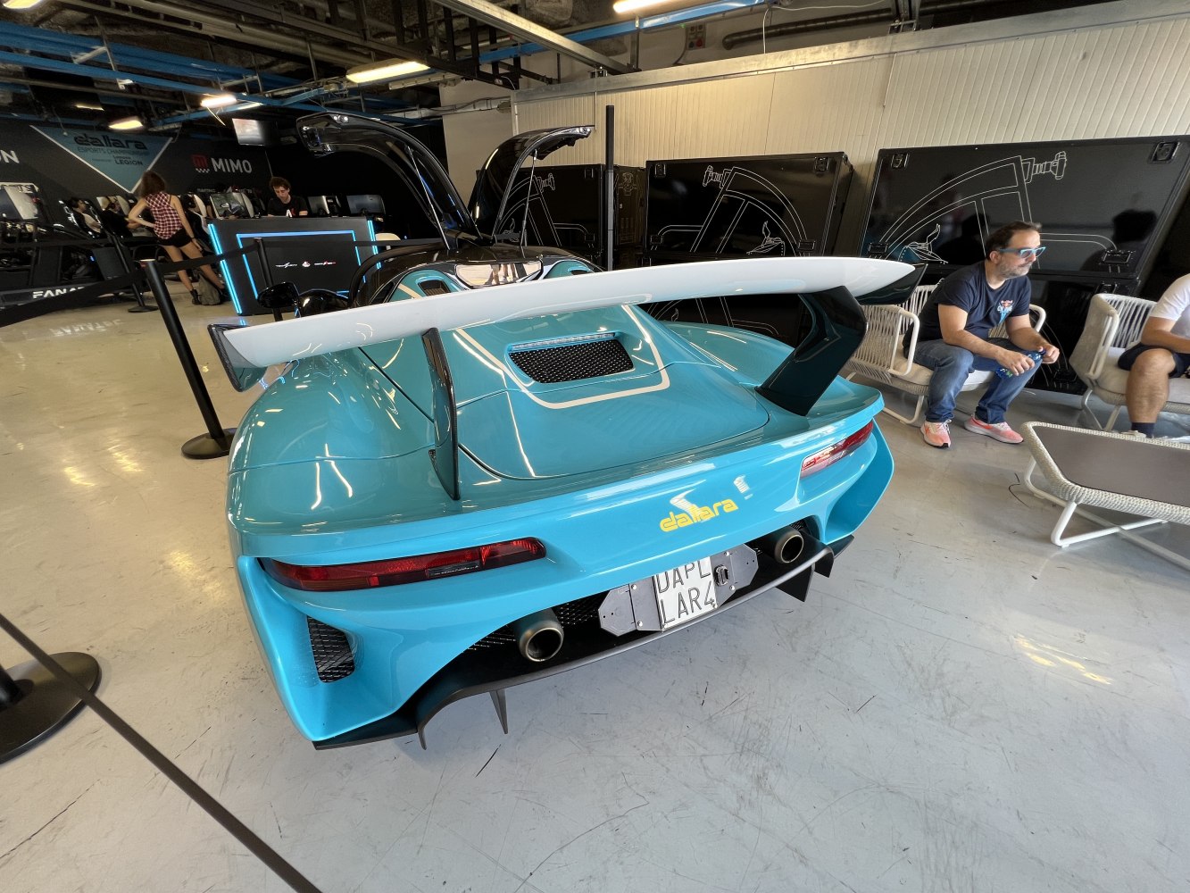 Rear view with large rear wing and aerodynamic diffuser