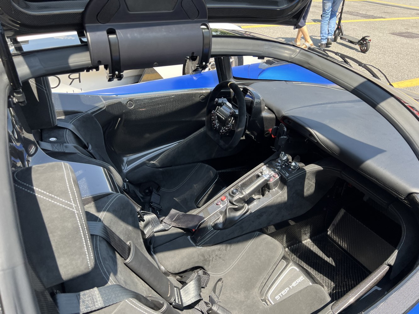 Carbon fiber interior with racing seats and specialized steering wheel
