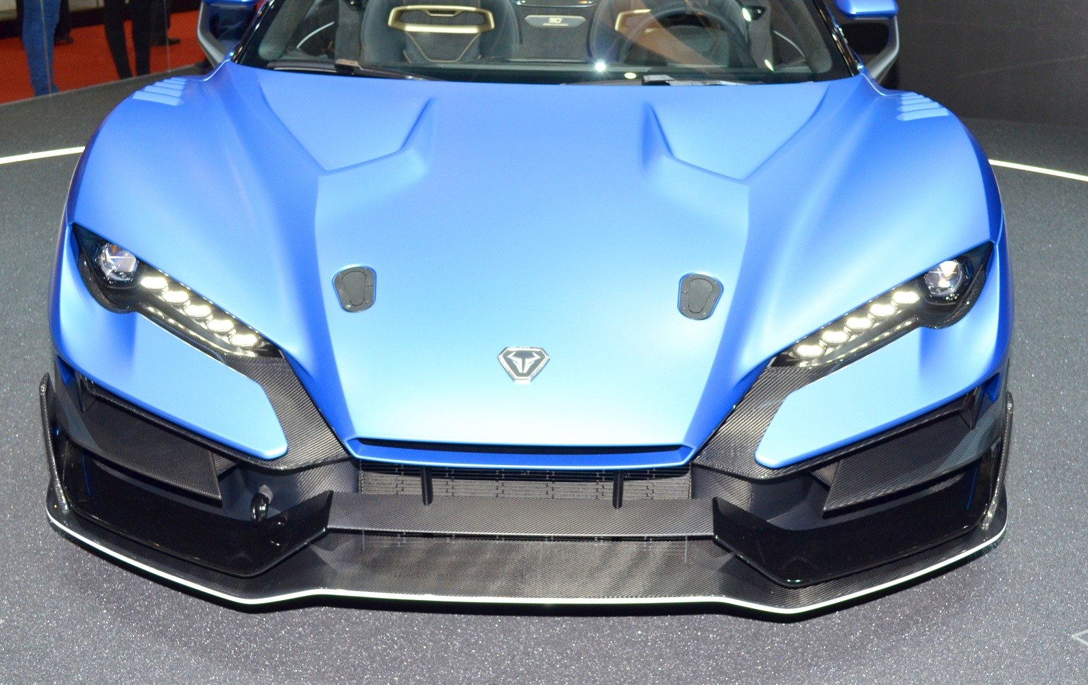 Aggressive front fascia with LED headlights and aerodynamic carbon fiber details