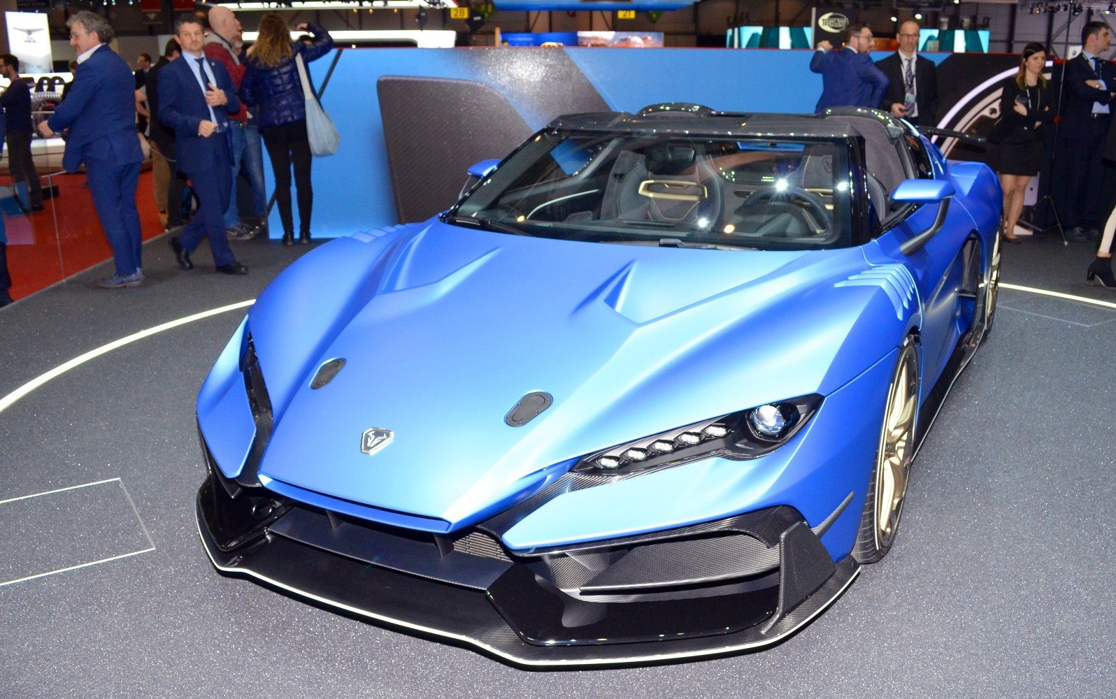Sleek aerodynamic front with sharp LED lights and aggressive styling