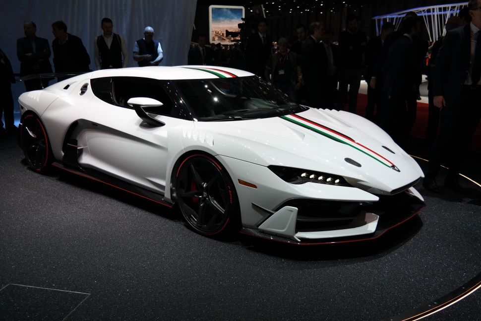 White sports car with Italian flag stripes and aggressive aerodynamic design