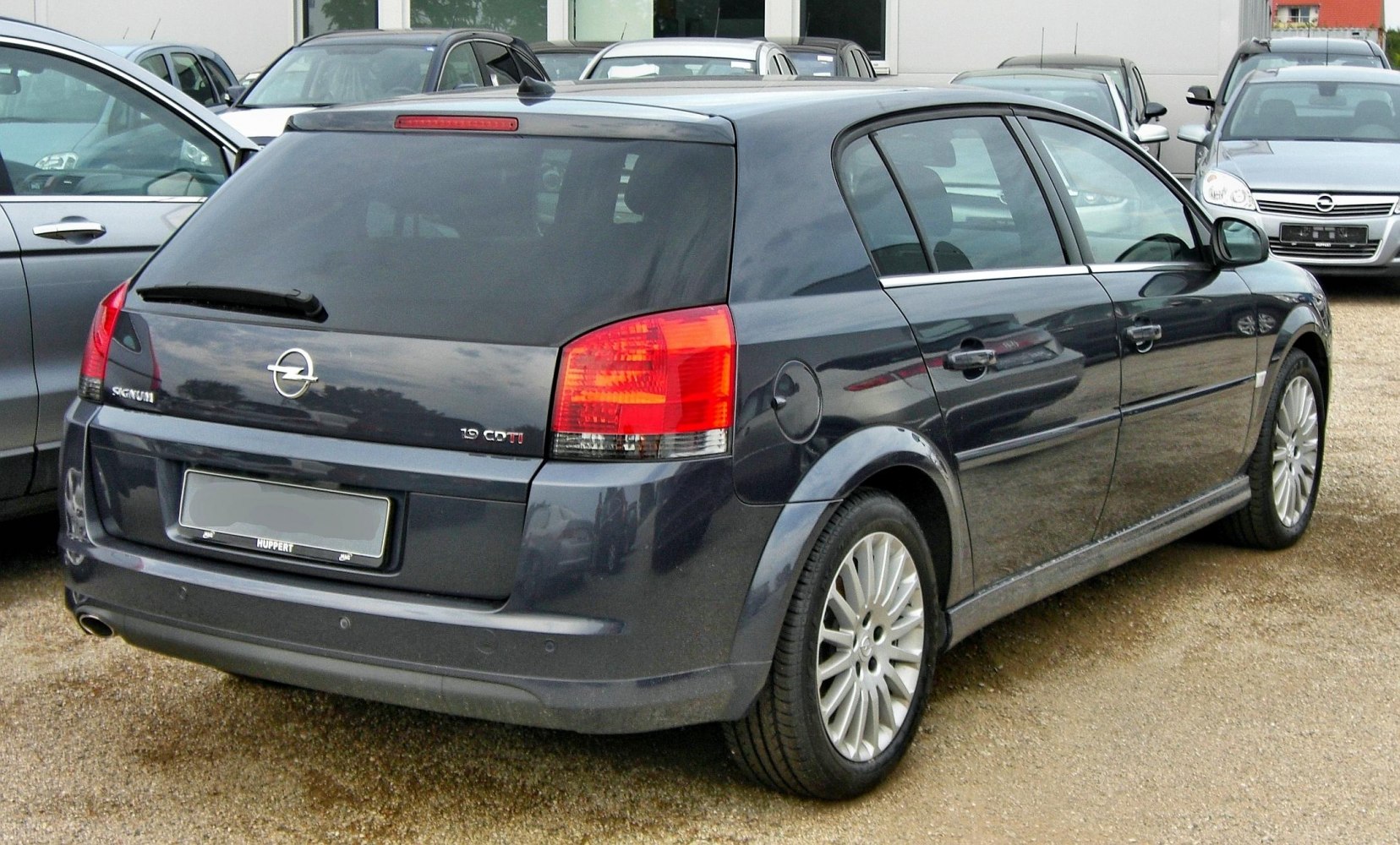 Rear view with tail lights and alloy wheels