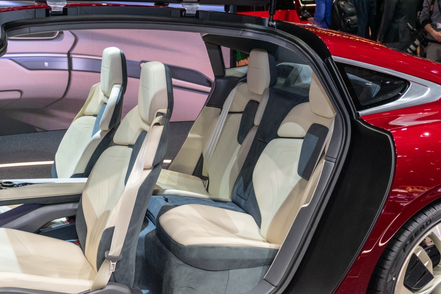 Luxury four-seat layout with premium beige and gray upholstery and headrests