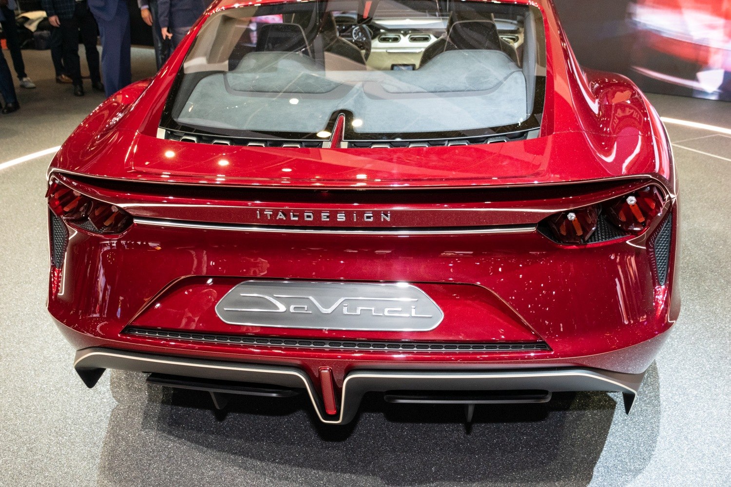 Sleek rear design with distinctive futuristic tail lights and rear window.