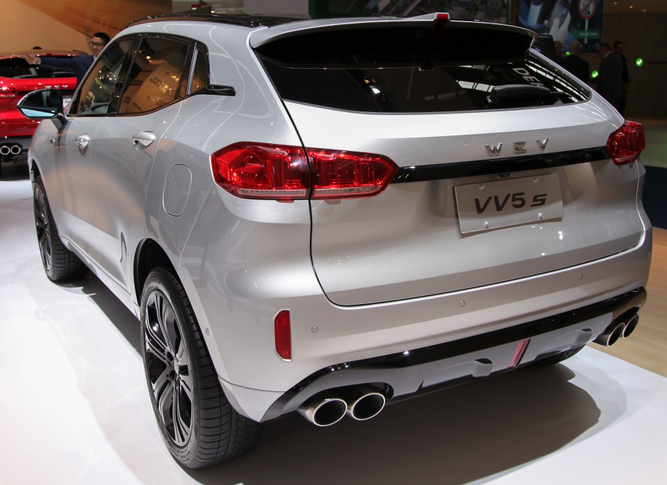 Rear view of an SUV with dual exhaust and distinctive taillights