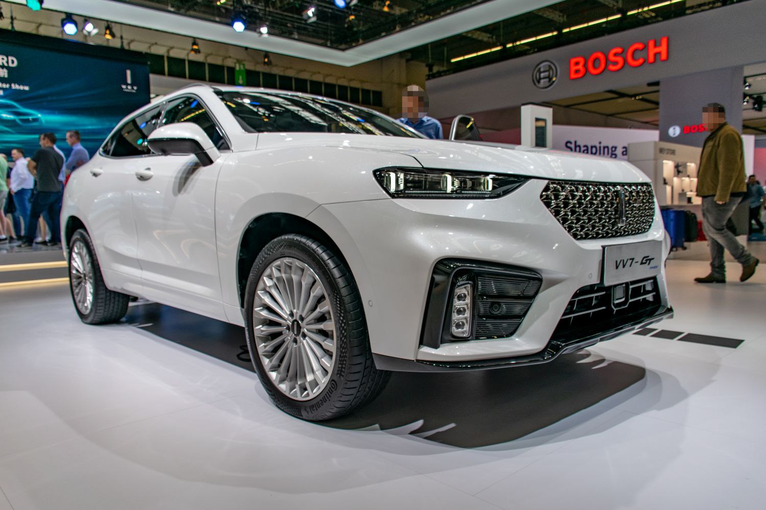 Front view with LED headlights and distinctive grille