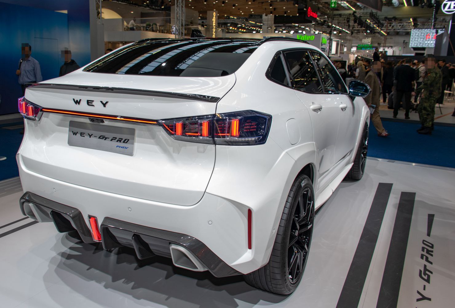 Rear view with LED taillights and sporty dual exhausts.