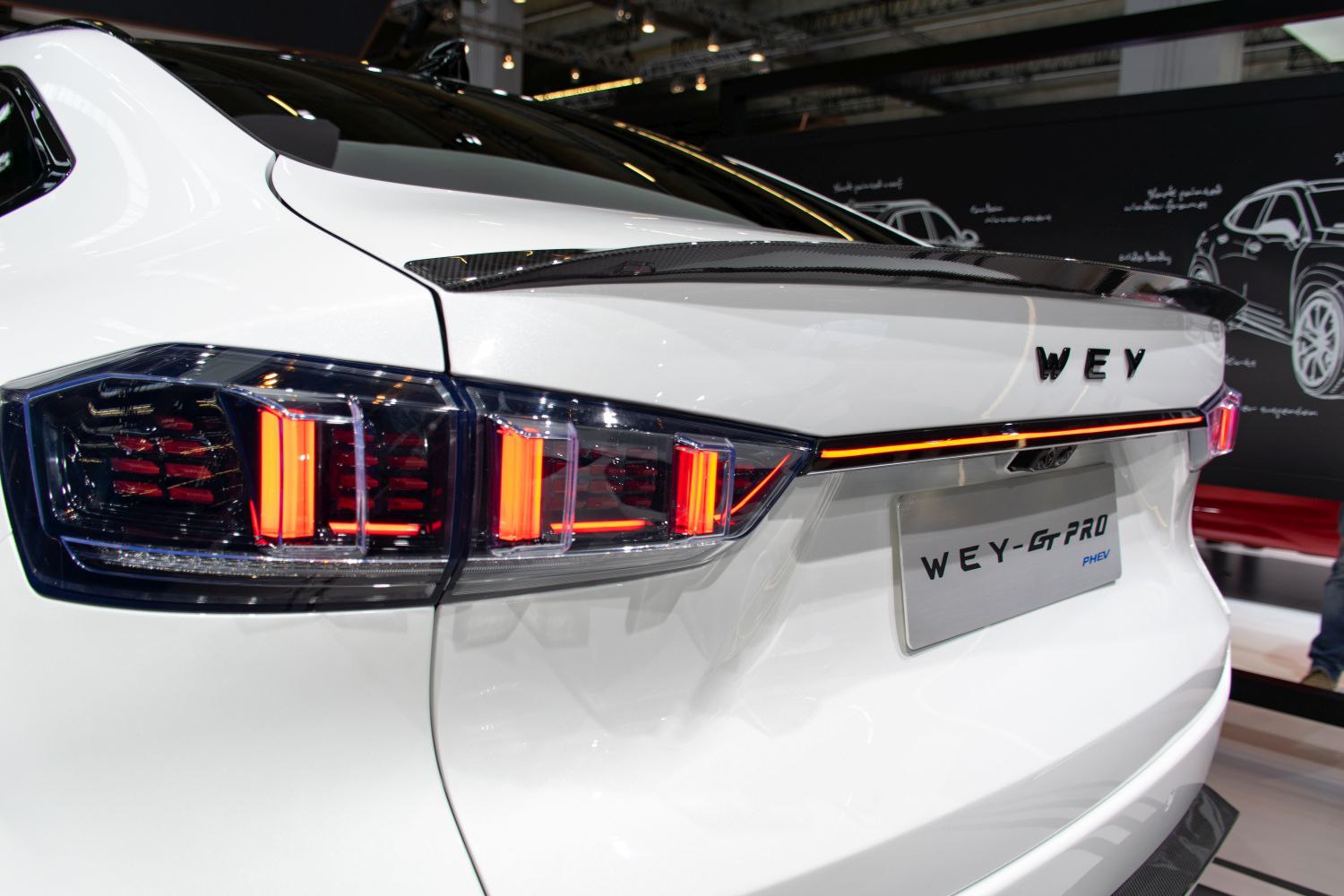LED tail lights and trunk spoiler of a modern SUV rear