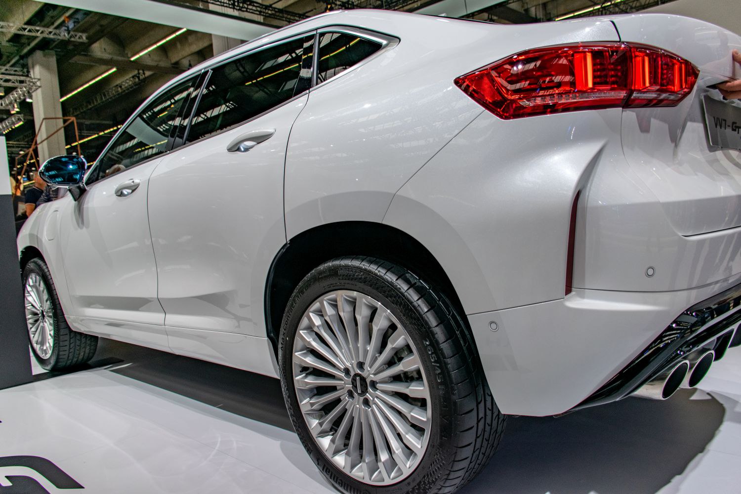 Rear side profile with alloy wheel and taillight details