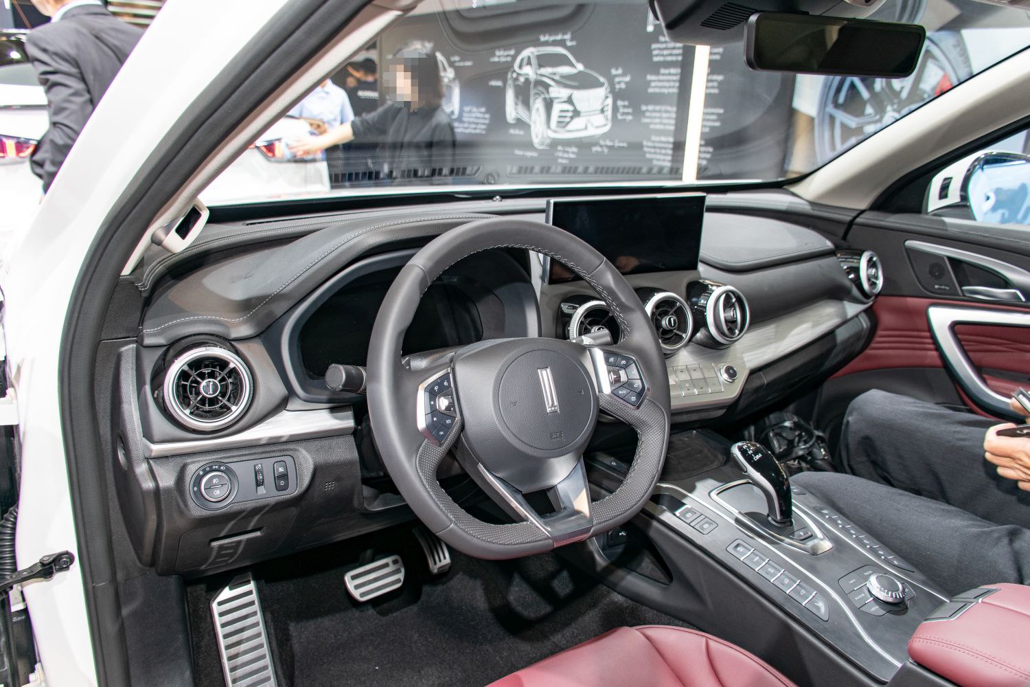 Modern interior with multifunction steering wheel and dashboard controls